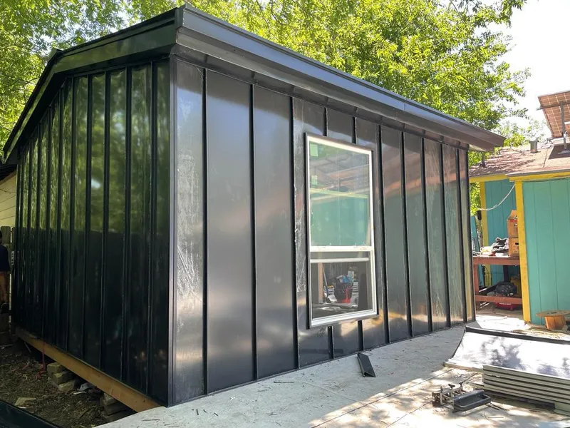 Black standing seam metal wall panels for Roof Inspection in Chula Vista